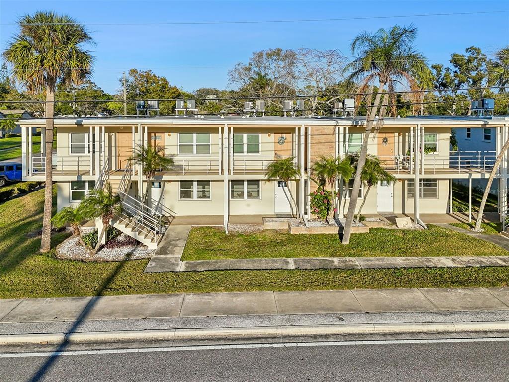 4565 Duhme Road, Unit 203 St. Petersburg, FL 33708 - Photo 27 of 27 front view of a house with a yard