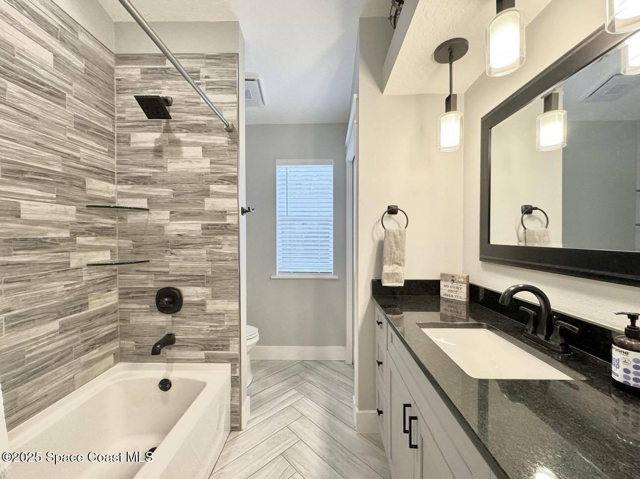 4043 Sparrow Hawk Road Melbourne, FL 32934 - Photo 17 of 33 Guest Bathroom