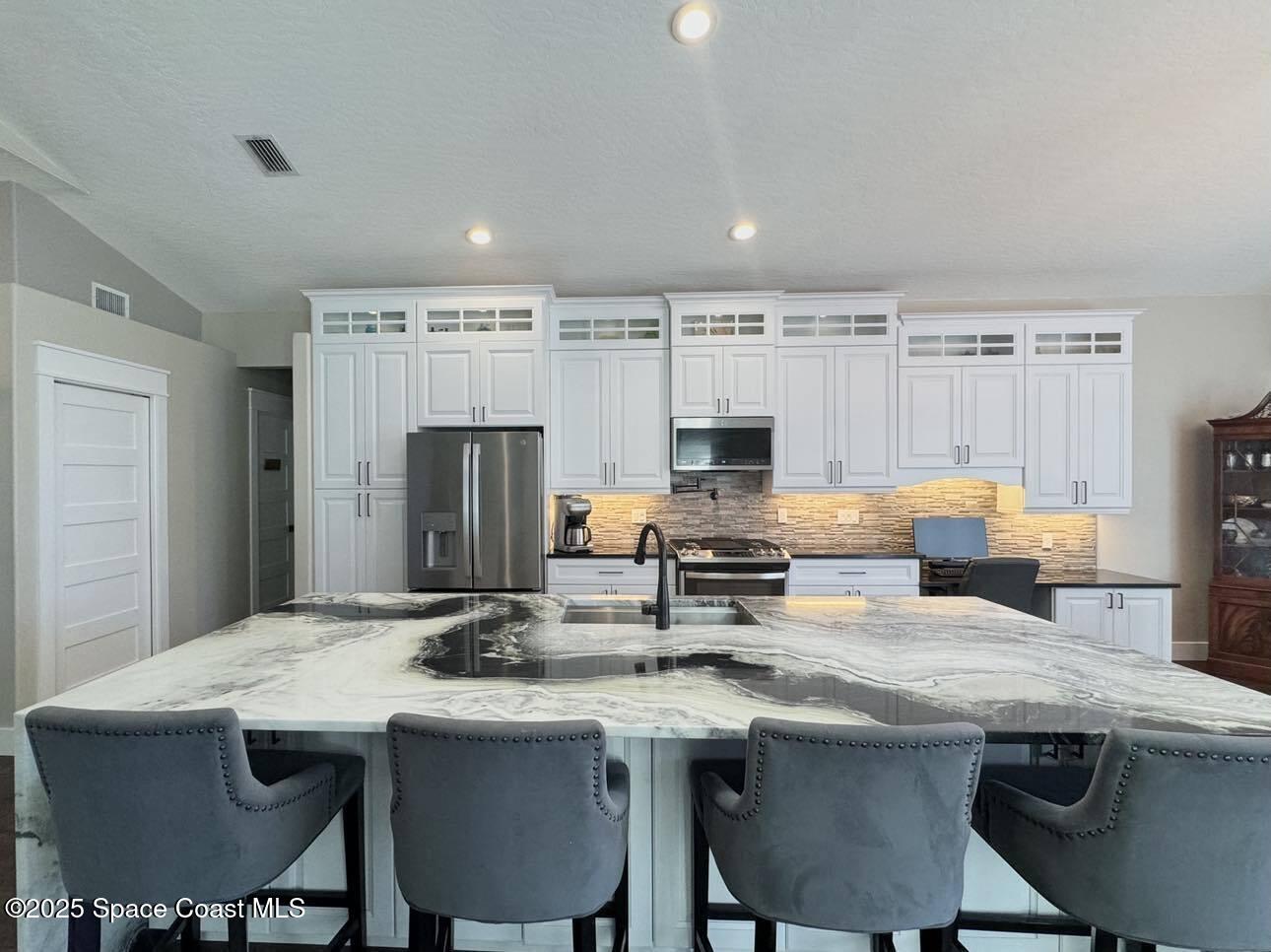 4043 Sparrow Hawk Road Melbourne, FL 32934 - Photo 5 of 33 Kitchen Island 2
