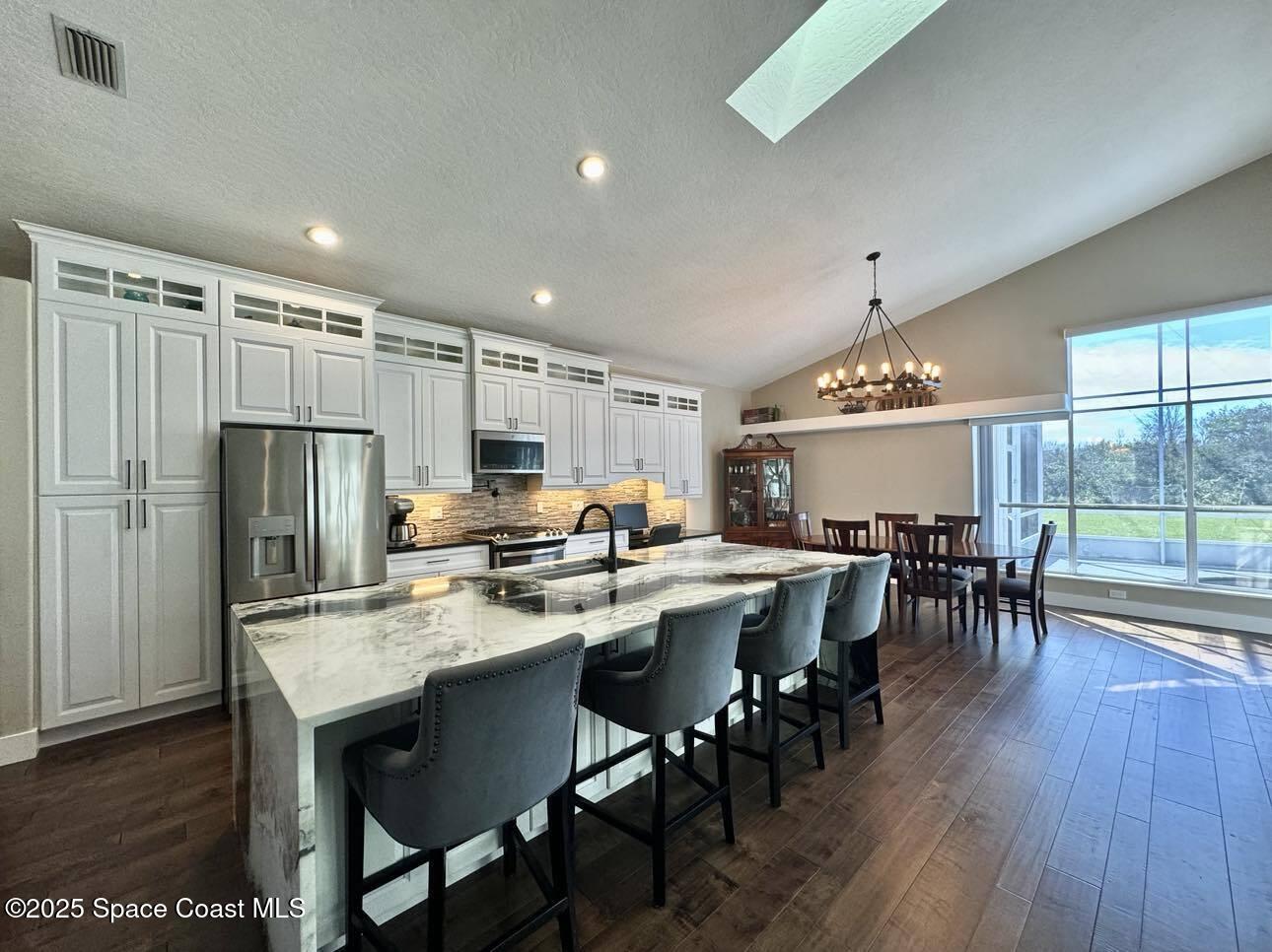 4043 Sparrow Hawk Road Melbourne, FL 32934 - Photo 6 of 33 Kitchen 2
