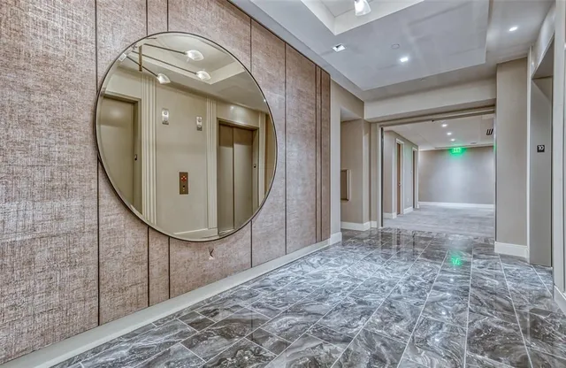 a view of a hallway with entryway