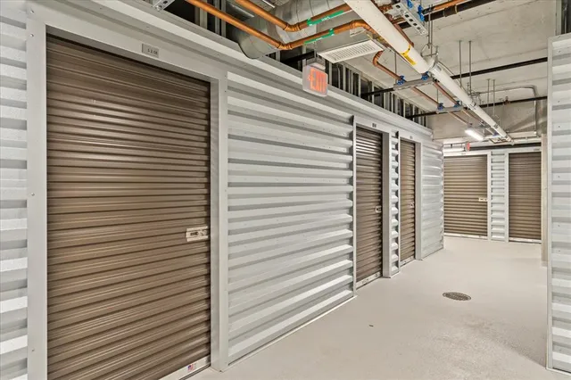 a swimming pool with outdoor seating and yard