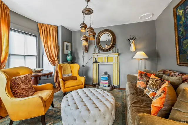 a living room with furniture and a window