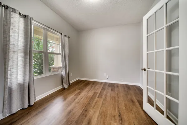 a kitchen with stainless steel appliances granite countertop a sink stove and microwave