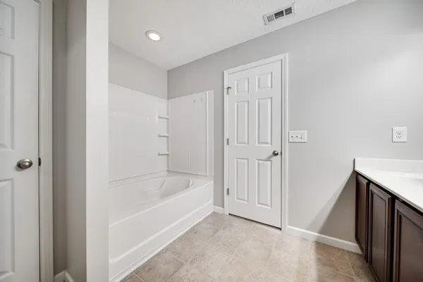 a bathroom with a bathtub