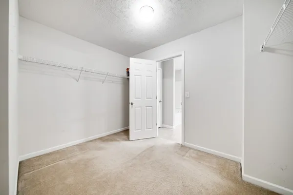 a view of a house with backyard and garden