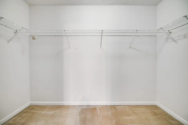 a swimming pool with outdoor seating and city view