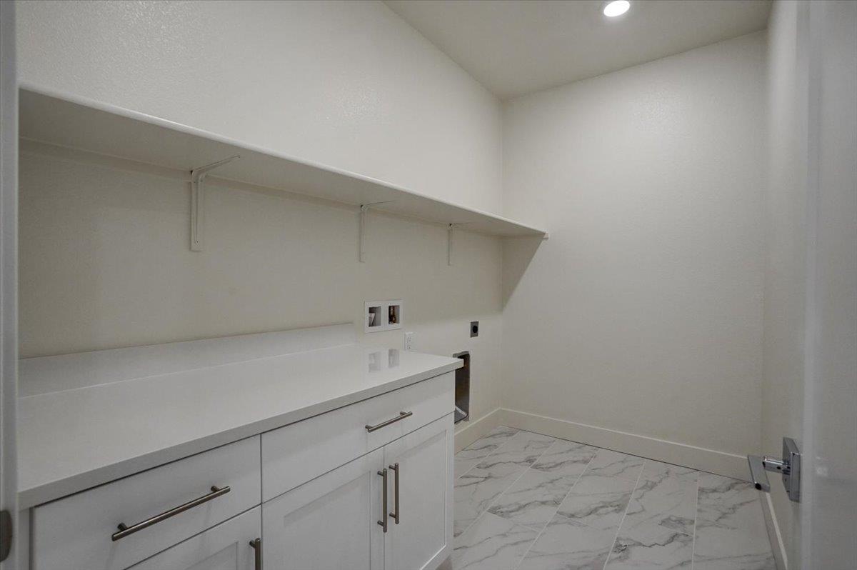 12101 Almeria Way San Ramon, CA 94583 - Photo 18 of 44 a utility room with cabinets