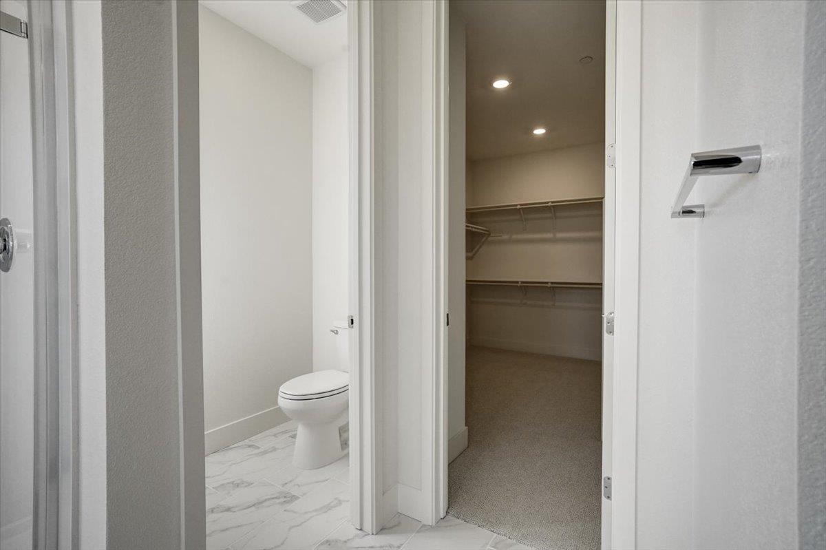 12101 Almeria Way San Ramon, CA 94583 - Photo 30 of 44 a bathroom view of a toilet and a sink