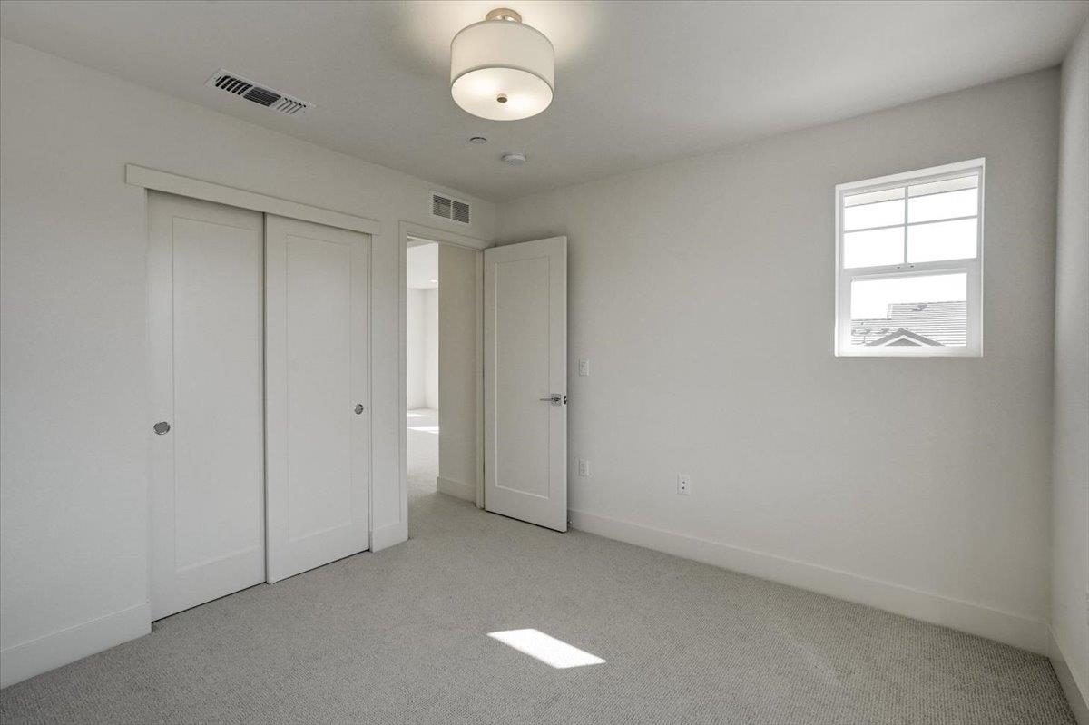 12101 Almeria Way San Ramon, CA 94583 - Photo 36 of 44 an empty room with windows and closet