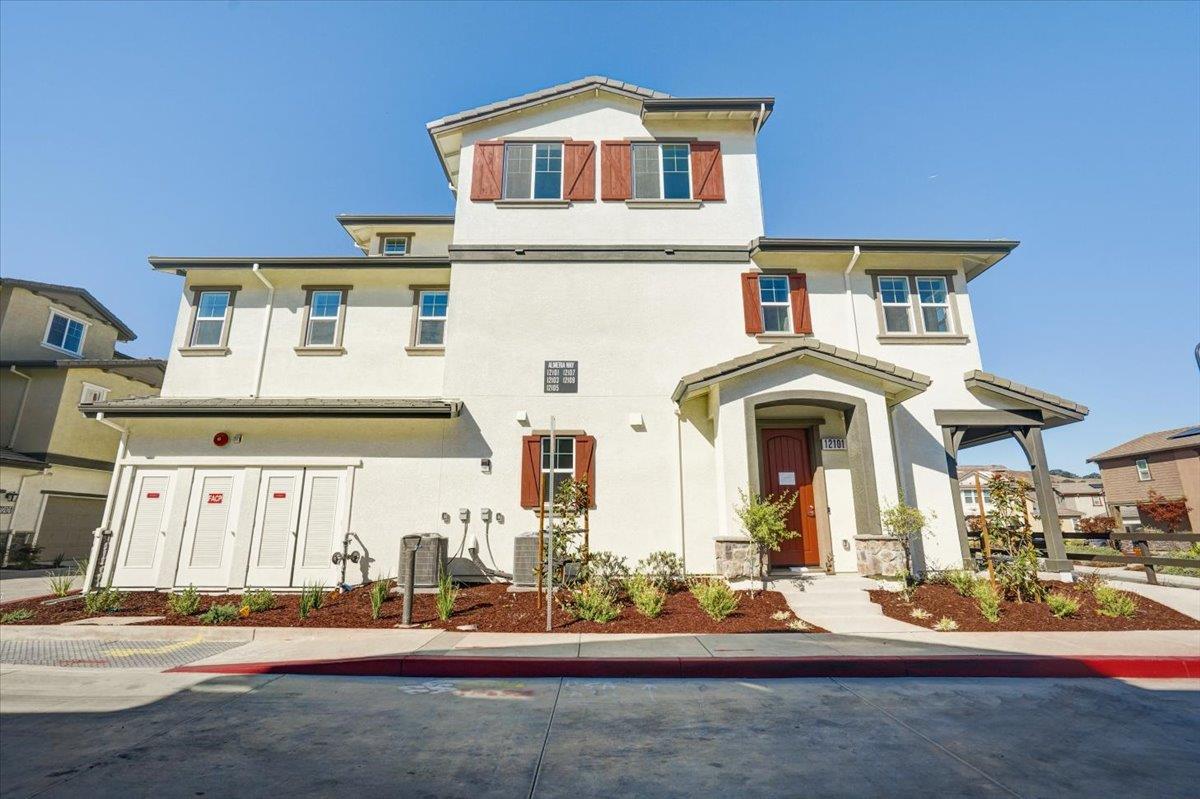 12101 Almeria Way San Ramon, CA 94583 - Photo 4 of 44 a front view of a house with a yard