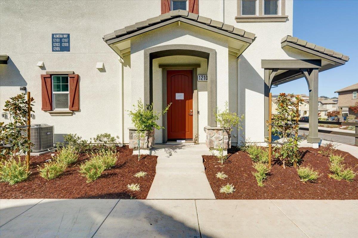 12101 Almeria Way San Ramon, CA 94583 - Photo 7 of 44 a view of a house with potted plants