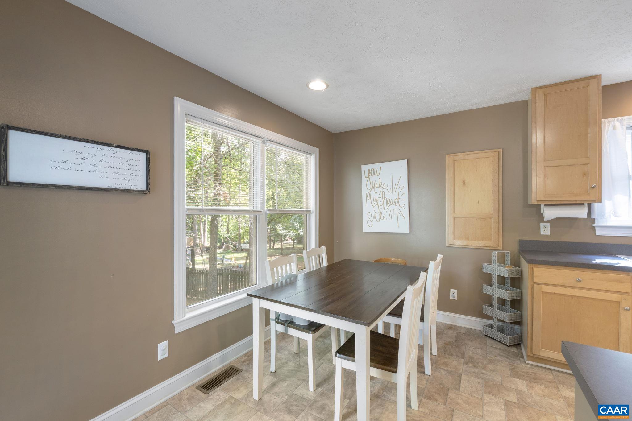 4 Clark Court Palmyra, VA 22963 - Photo 14 of 58 a view of a dining room with furniture window and outside view