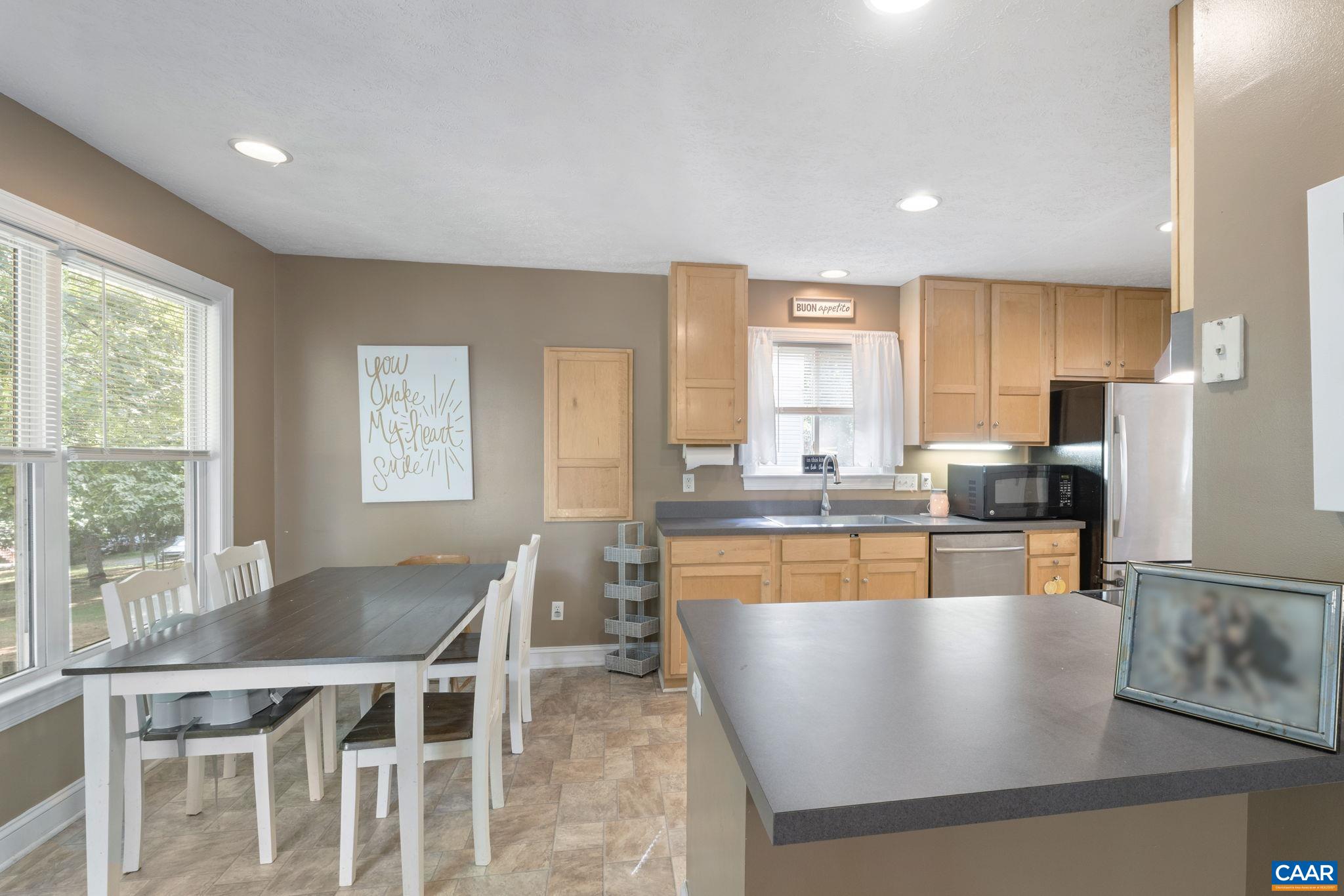 4 Clark Court Palmyra, VA 22963 - Photo 18 of 58 a large kitchen with kitchen island a large window in it