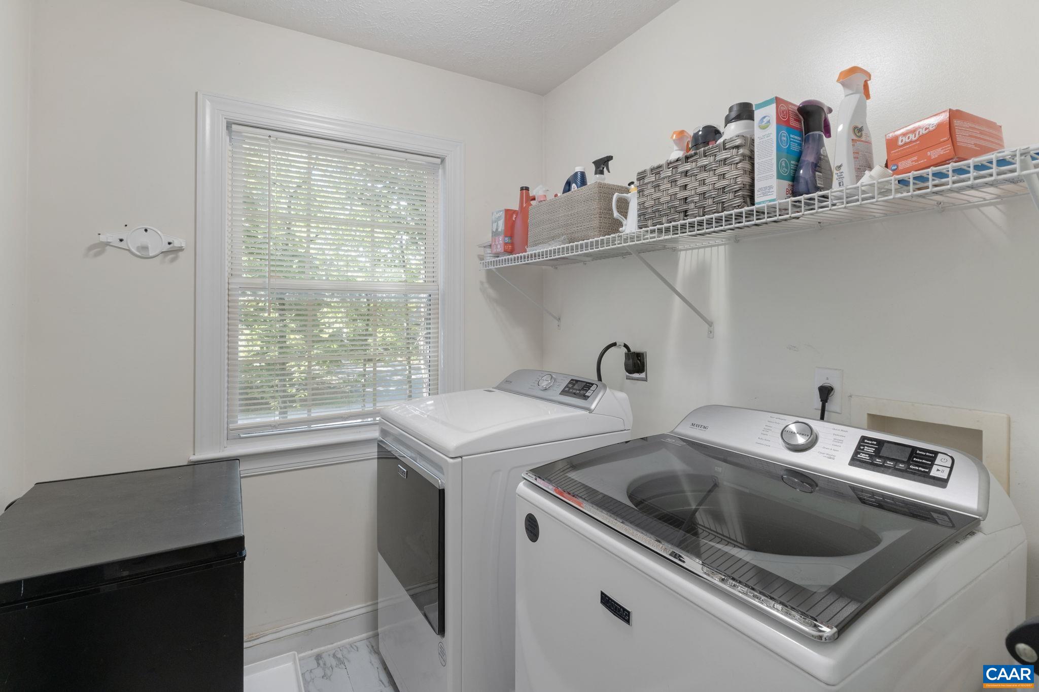 4 Clark Court Palmyra, VA 22963 - Photo 24 of 58 a utility room with sink dryer and washer