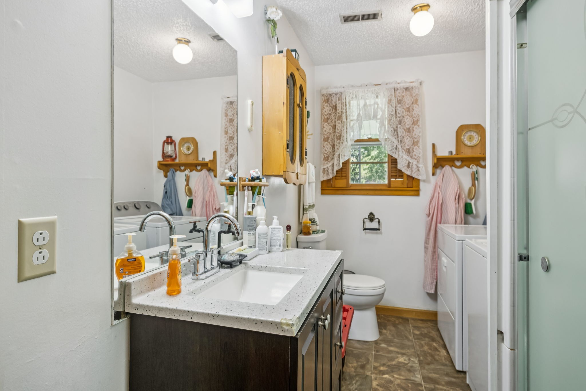 5165 Almaville Road Smyrna, TN 37167 - Photo 26 of 37 a bathroom with a sink mirror vanity and toilet