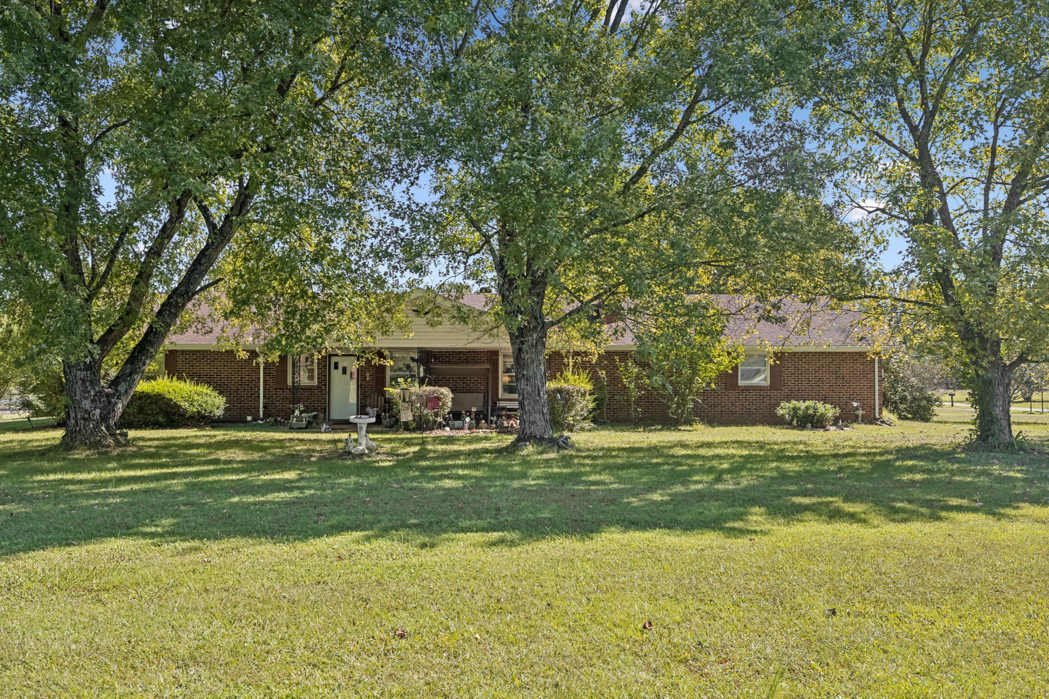 5165 Almaville Road Smyrna, TN 37167 - Photo 3 of 37 a view of a house with a big yard and large trees