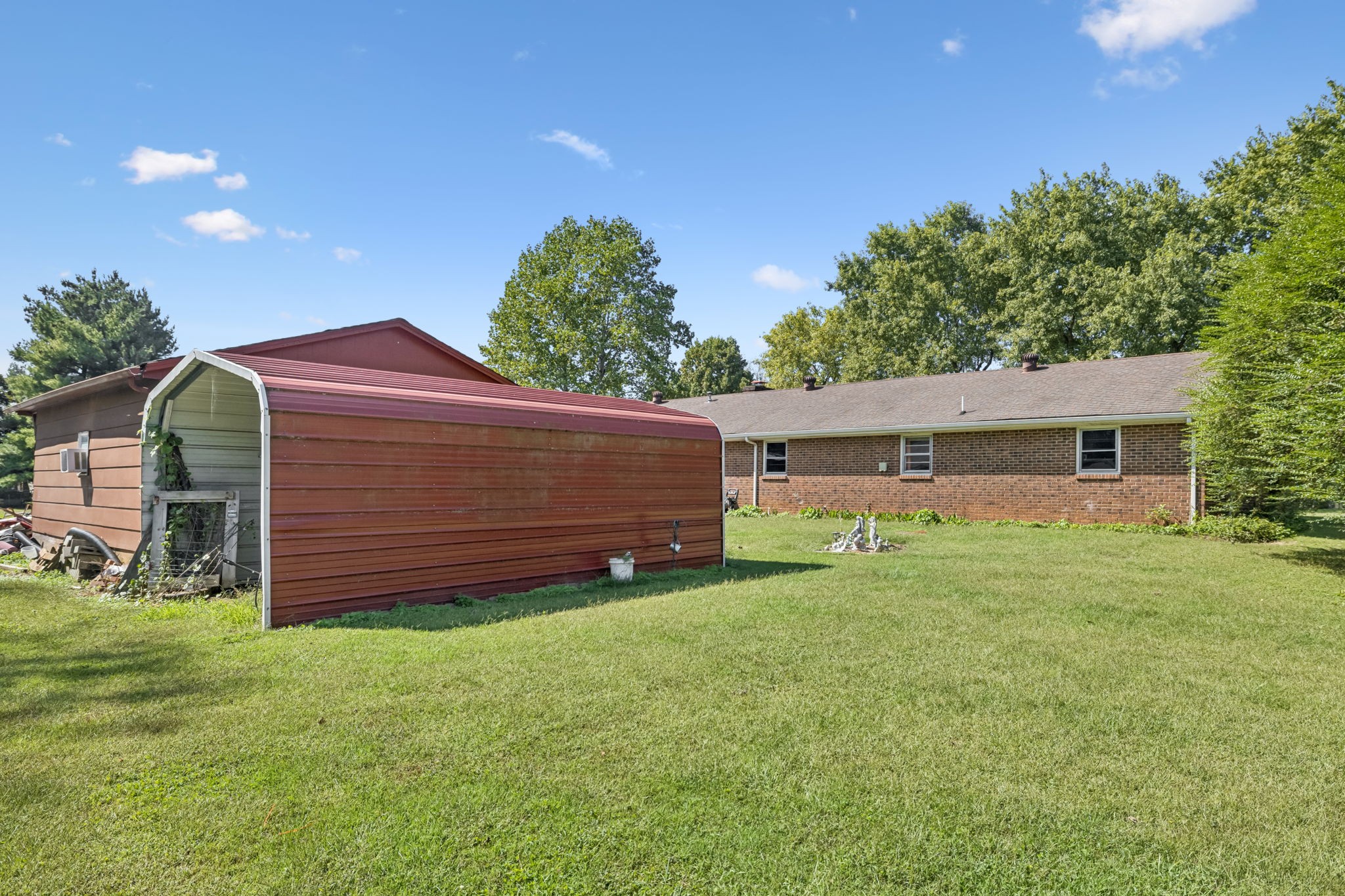 5165 Almaville Road Smyrna, TN 37167 - Photo 35 of 37 a backyard of a house with table and chairs