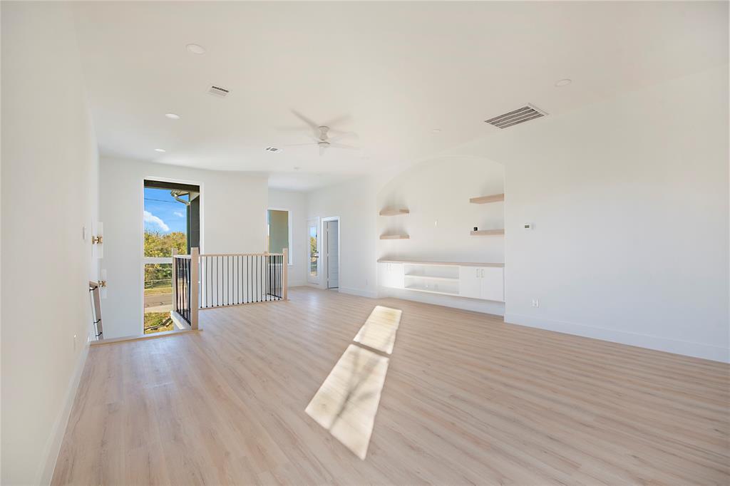 3902 Furey Street Dallas, TX 75212 - Photo 24 of 34 Spare room with light wood-type flooring, ceiling fan, and recessed lighting