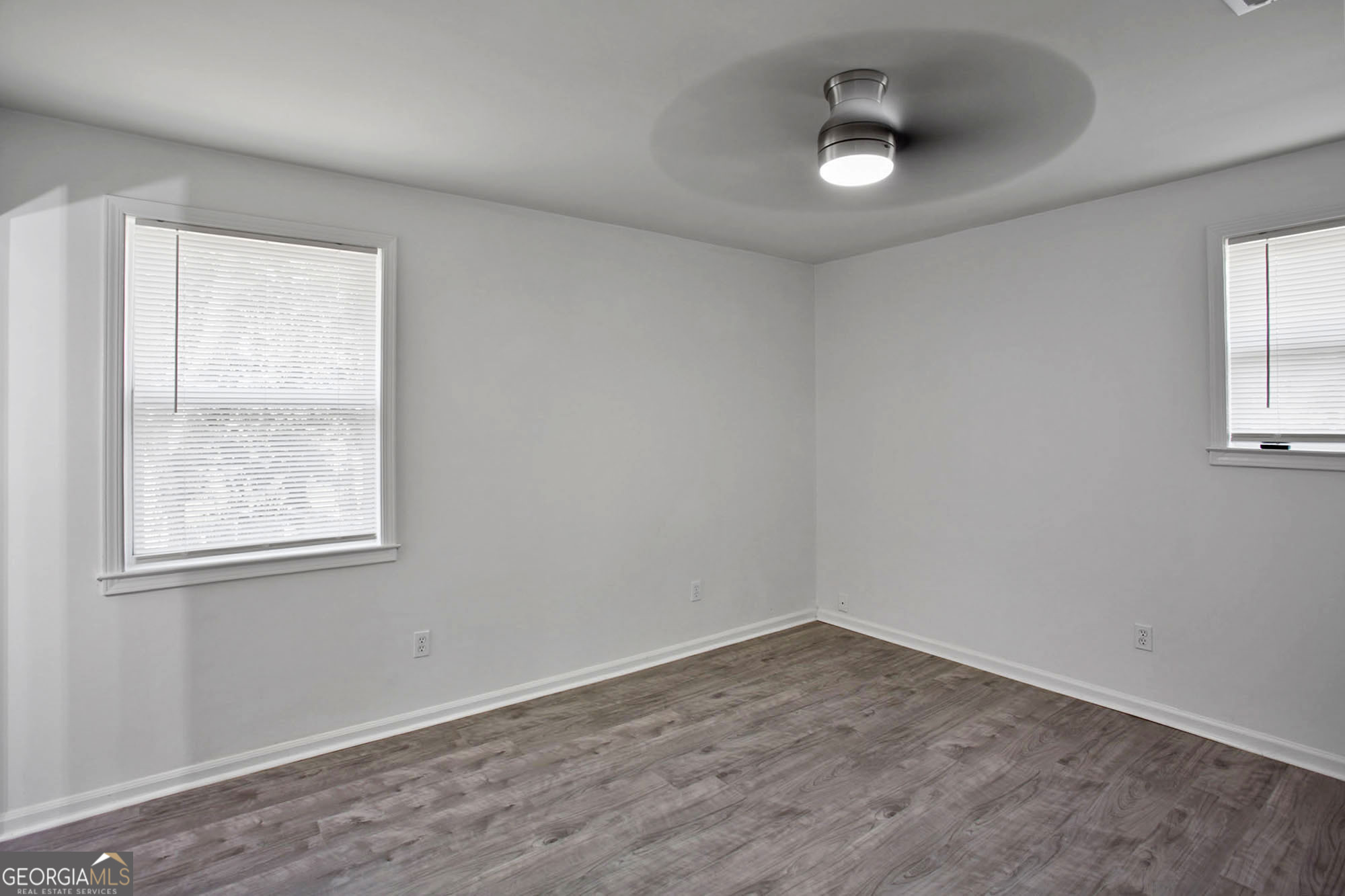 3 Cottonhill Road Eufaula, AL 36027 - Photo 13 of 16 an empty room with a window and a ceiling fan