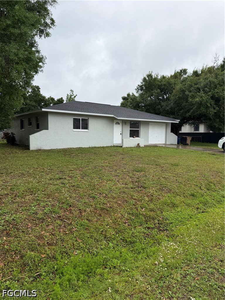a house with trees in the background