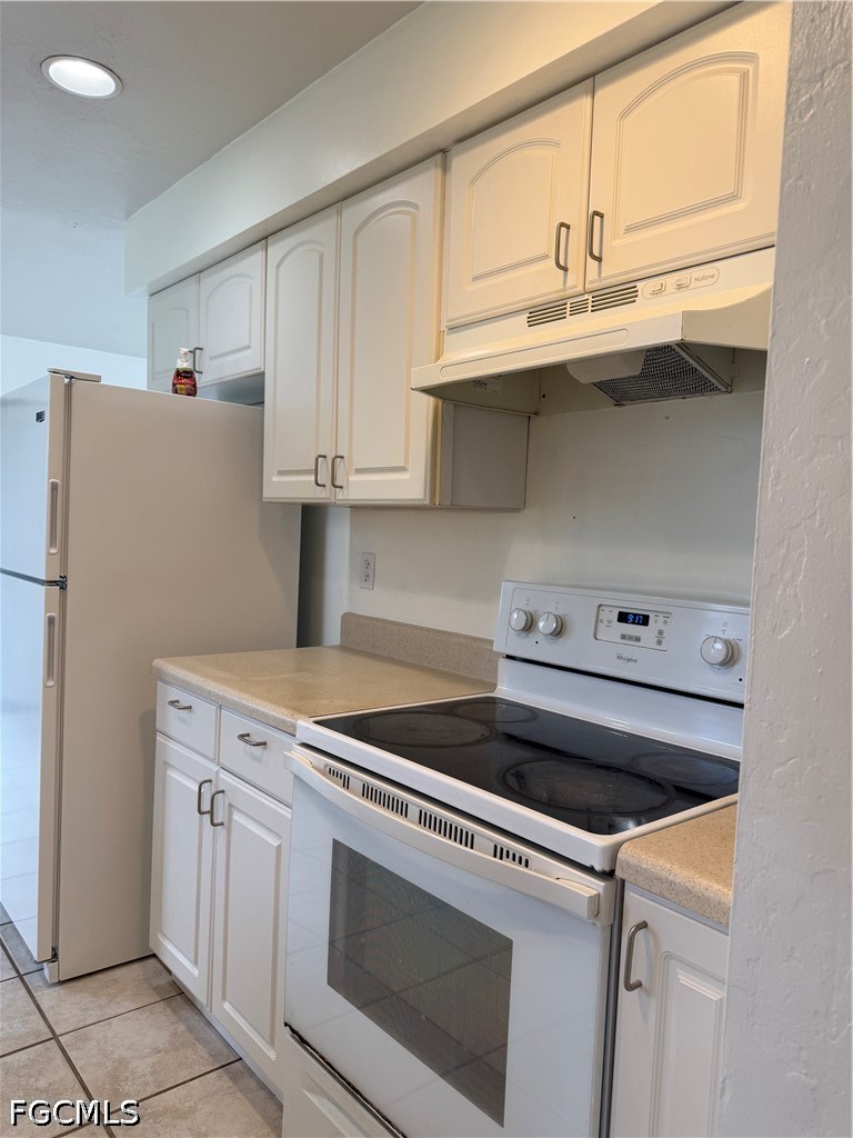 2610 W Road Fort Myers, FL 33905 - Photo 11 of 23 a kitchen with granite countertop cabinets appliances and a sink