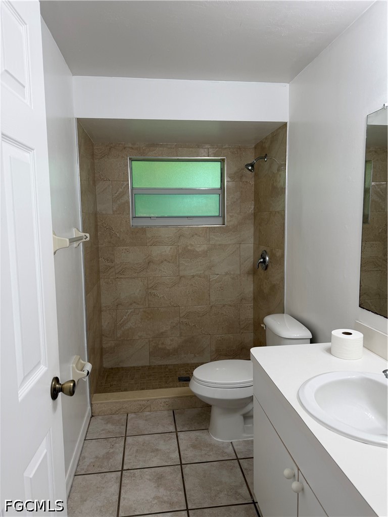 2610 W Road Fort Myers, FL 33905 - Photo 15 of 23 a bathroom with a sink a toilet and shower