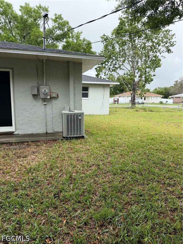 2610 W Road Fort Myers, FL 33905 - Photo 21 of 23 a front view of a house with garden