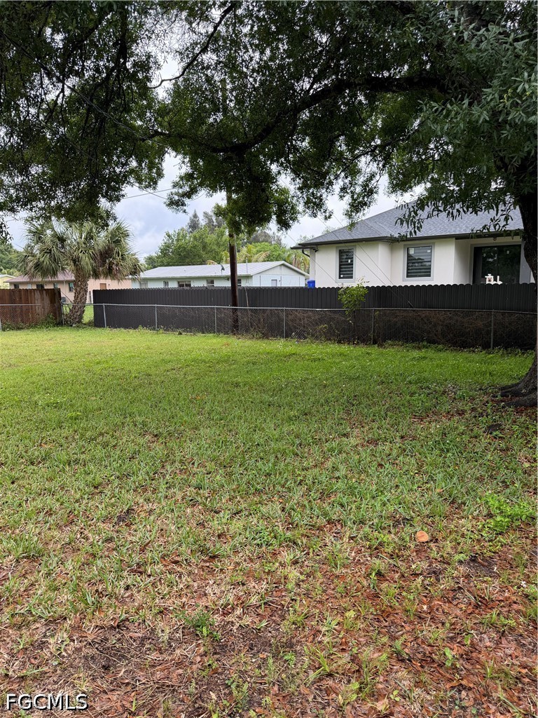 2610 W Road Fort Myers, FL 33905 - Photo 22 of 23 a view of backyard with green space