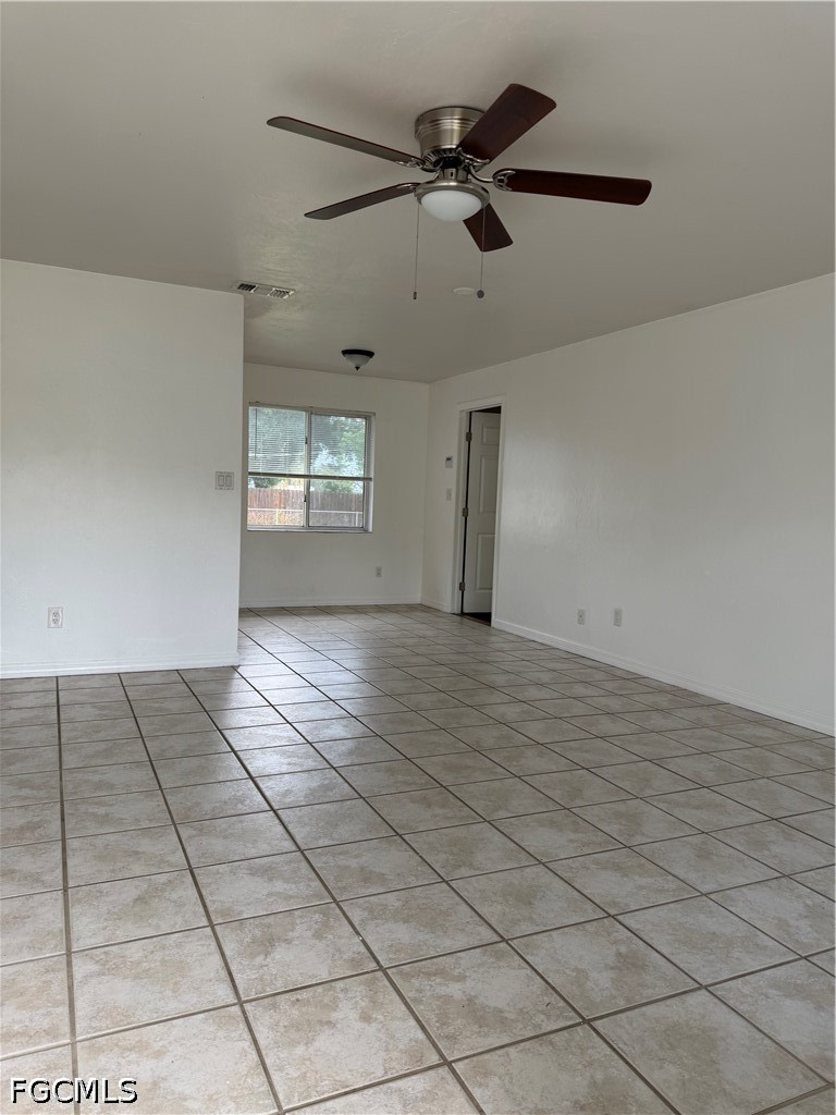 2610 W Road Fort Myers, FL 33905 - Photo 5 of 23 a view of an empty room and window