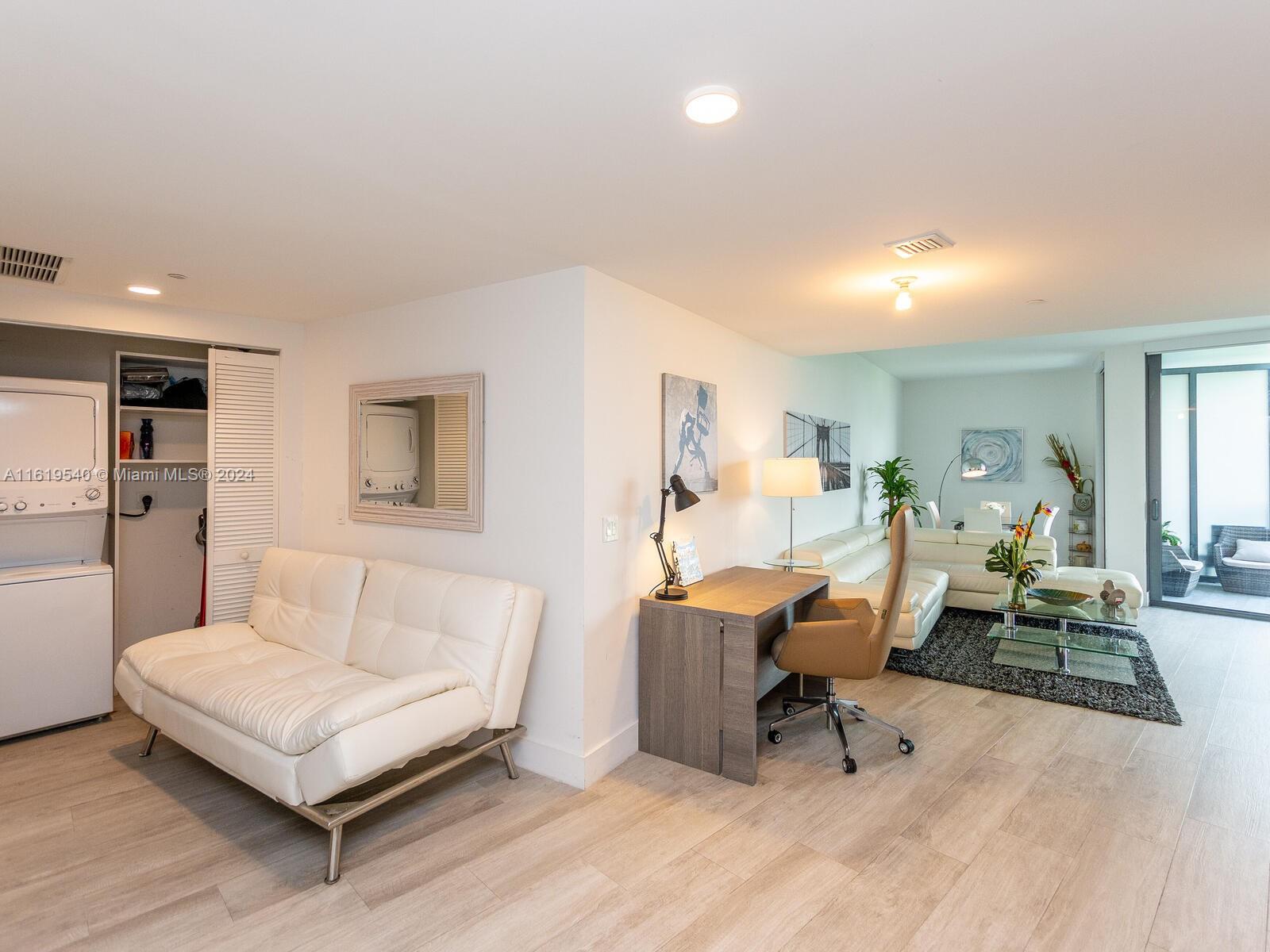 121 Northeast 34th Street, Unit 1014 Miami, FL 33137 - Photo 15 of 30 a living room with furniture