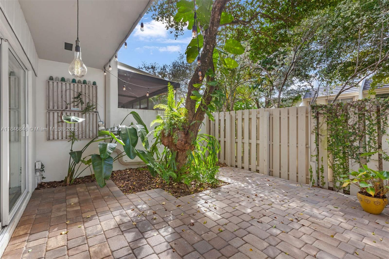 8218 Southwest 82nd Court Miami, FL 33143 - Photo 5 of 20 a view of a backyard with plants