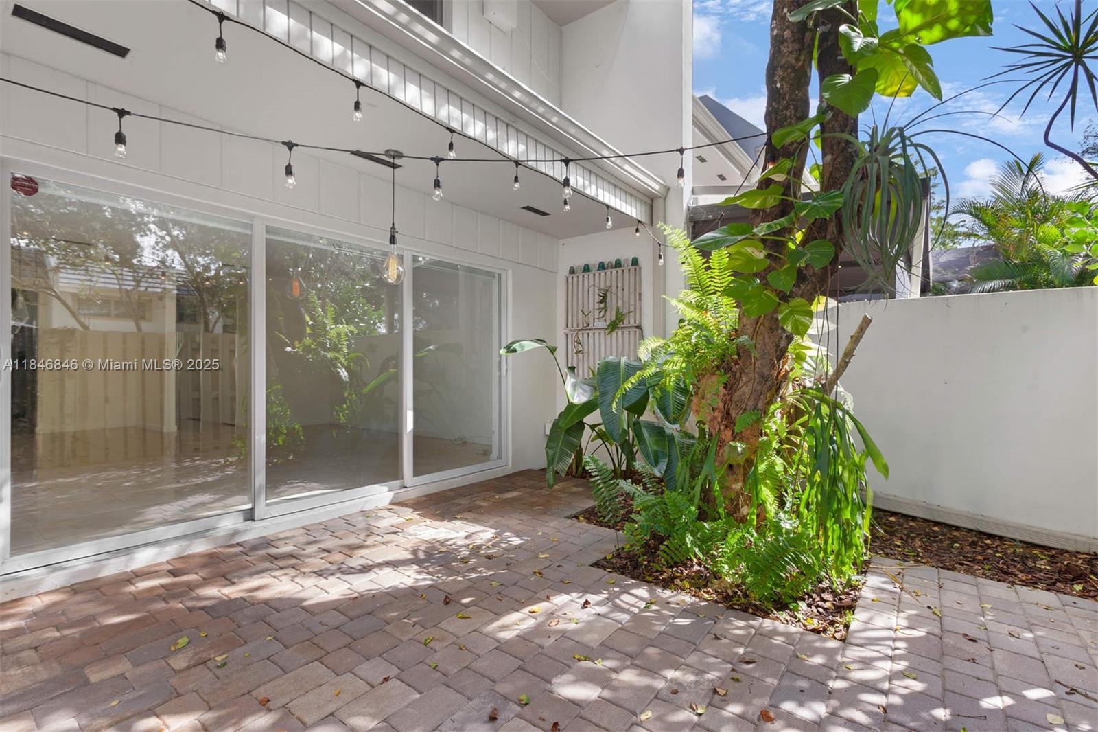 8218 Southwest 82nd Court Miami, FL 33143 - Photo 6 of 20 a view of a bathroom with a plant