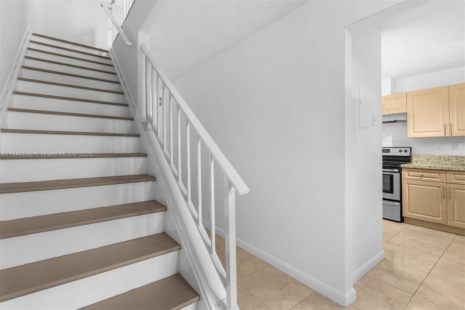 8218 Southwest 82nd Court Miami, FL 33143 - Photo 10 of 20 a view of entryway and kitchen