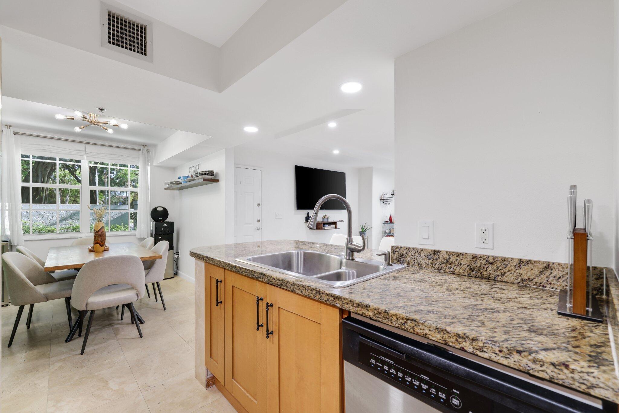 3143 Clint Moore Road, Unit 107 Boca Raton, FL 33496 - Photo 16 of 40 Open Kitchen