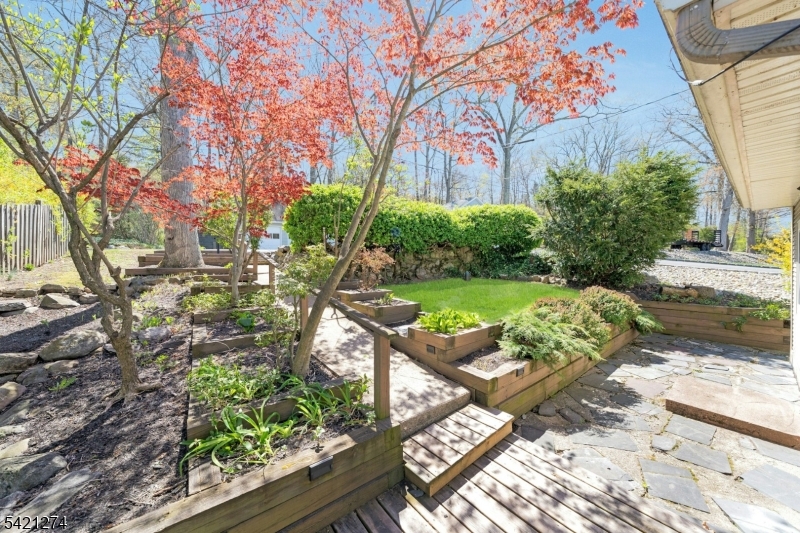 95 Wildwood Road Oak Ridge, NJ 07438 - Photo 3 of 36 a view of yard with seating space