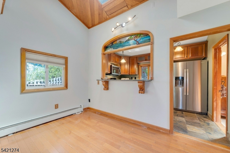 95 Wildwood Road Oak Ridge, NJ 07438 - Photo 6 of 36 a view of an entryway with wooden floor