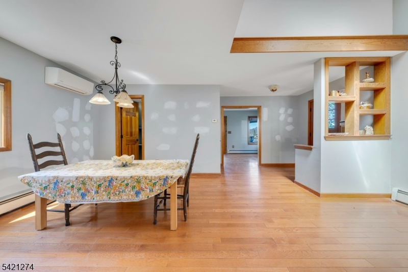 95 Wildwood Road Oak Ridge, NJ 07438 - Photo 8 of 36 a dining room with furniture and window
