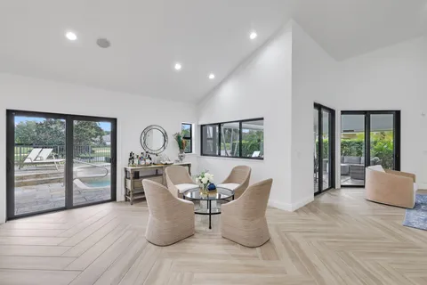 a dining room with furniture window wooden floor