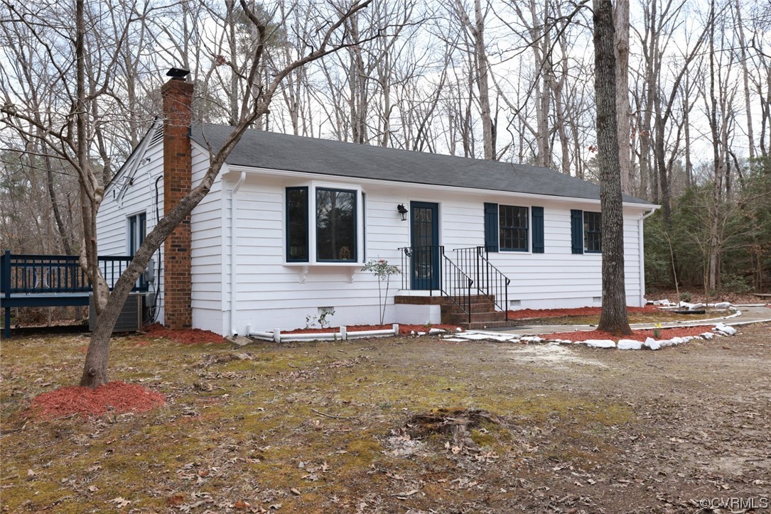 6706 Belmont Road Chesterfield, VA 23832 - Photo 7 of 43 a view of a house with a yard