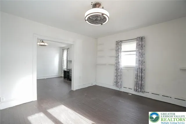 a kitchen with a stove and a sink