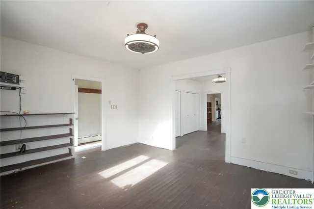 a kitchen with a sink cabinets and stainless steel appliances