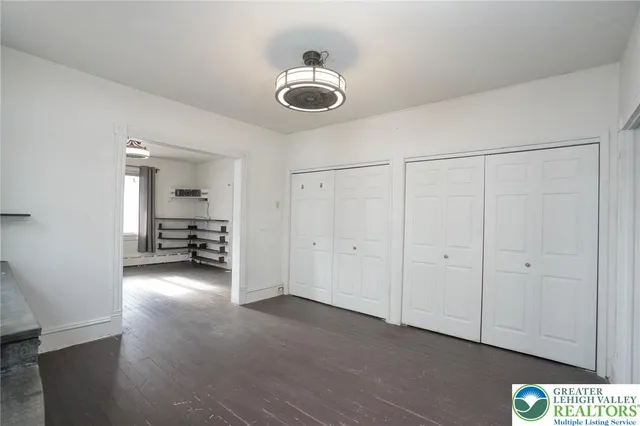 a bathroom with a shower and a toilet