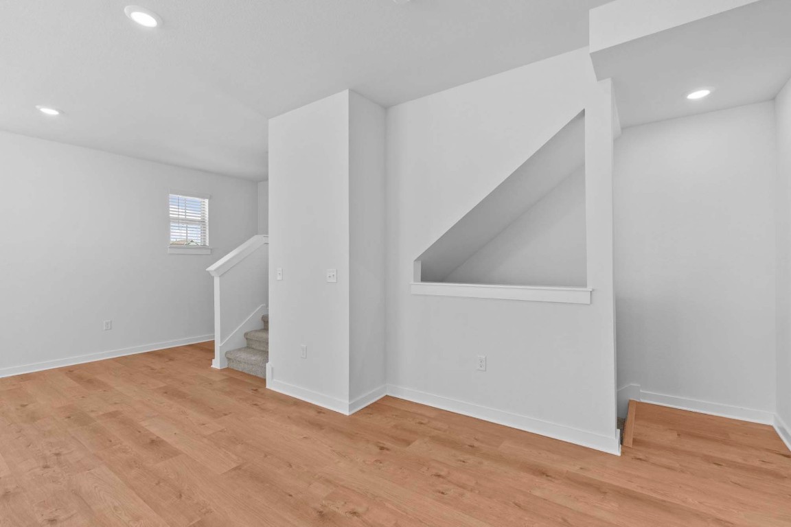 6400 Stockman Drive, Unit 5 Austin, TX 78747 - Photo 11 of 35 a view of an empty room with wooden floor