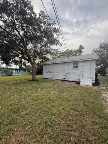 a front view of house with yard