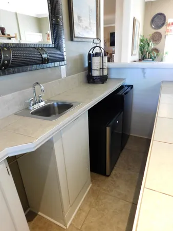 a kitchen with a sink and a stove