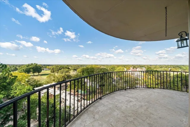 a view of balcony with furniture