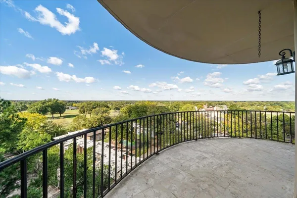 a view of balcony with furniture