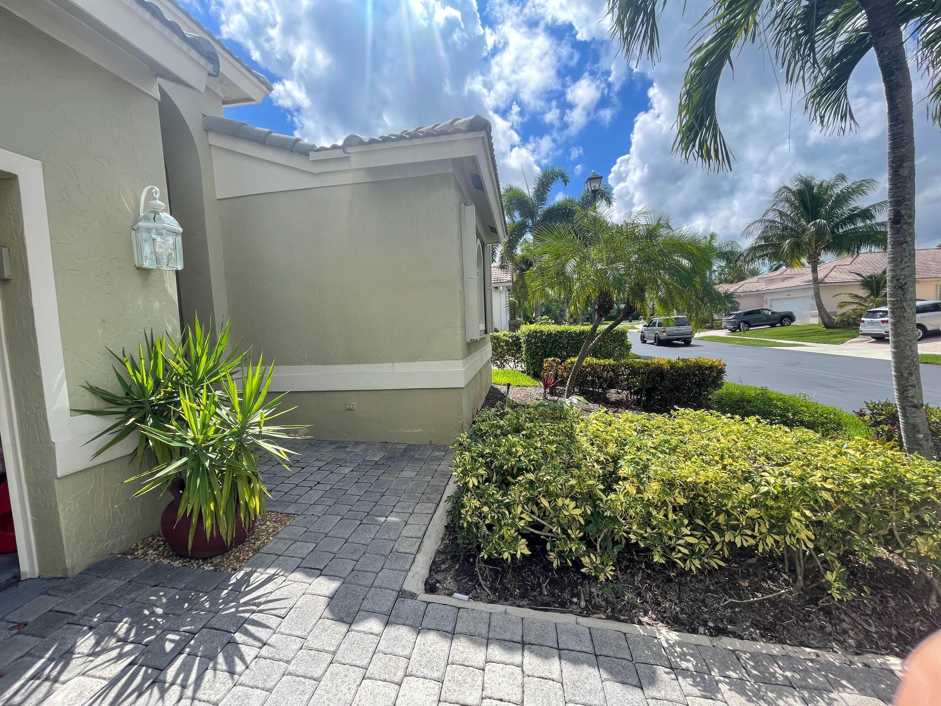 7060 Northwest Turtle Walk Boca Raton, FL 33487 - Photo 4 of 51 FRONT EXTERIOR
