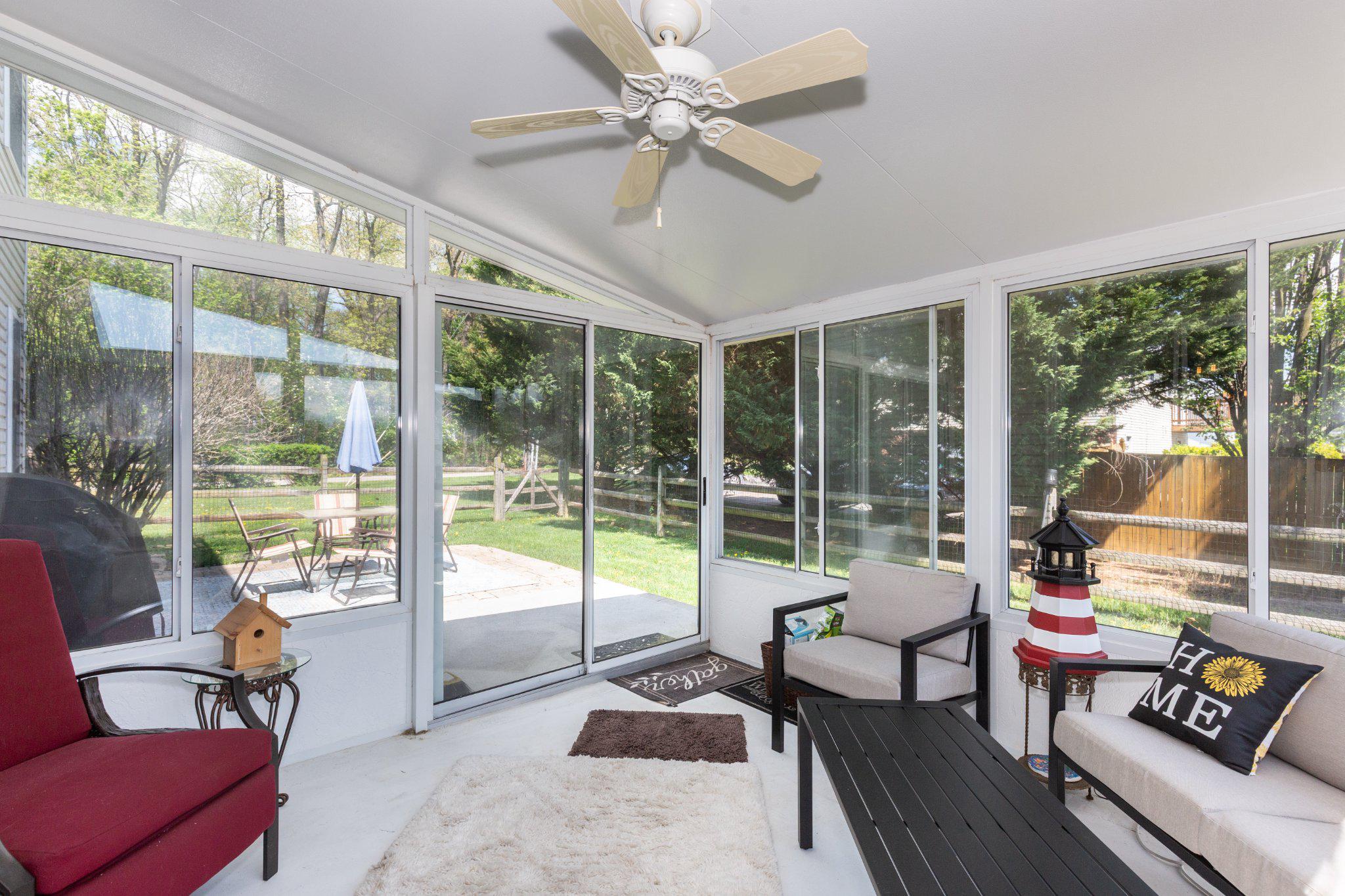 20 Union Street Littlestown, PA 17340 - Photo 17 of 58 a living room with furniture and a large window with garden view